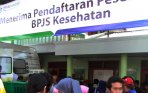 20140108_173822_warga-antre-mendaftar-peserta-bpjs-depok.jpg