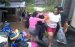 20140115_142208_sungai-sario-manado-meluap-tenggelamkan-beberapa-rumah.jpg