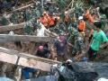 20140118_175116_pencarian-korban-tomohon-banjir-manadi.jpg