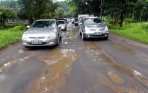 20140121_120436_jalan-lenteng-agung-jakarta-rusak-akibat-hujan.jpg