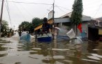 20140206_123622_banjir-pulo-raya-genangi-perumahan-elit.jpg