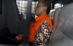 20140211_173912_tersangka-budi-mulya-usai-menandatangani-p21-di-kpk.jpg