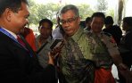 20140222_092917_akil-mochtar-jalani-sidang-perdana.jpg