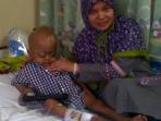 20140228_083849_haidar-bocah-penderita-kanker-langka.jpg