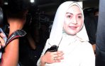 20140307_213936_eddies-adelia-penuhi-panggilan-penyidik-polda-metro-jaya.jpg