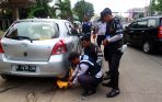 20140319_142813_petugas-dishub-depok-gembok-mobil-parkir-liar.jpg