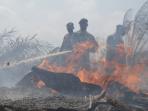 20140324_184408_proses-pemadaman-kebakaran-hutan-di-bengkalis.jpg