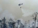 20140325_212854_helikopter-bnpb-padamkan-kebakaran-hutan-riau.jpg