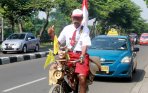20140610_132549_dadang-mengampanyekan-ayo-sekolah-dengan-bersepeda.jpg