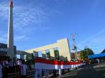 20140614_163429_pembentangan-bendera-merah-putih-di-depan-tugu-dwi-kora-nunukan.jpg