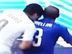 20140627_210337_luis-suarez-gigit-chiellini.jpg