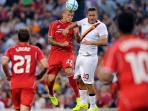 20140724_083707_francesco-totti-martin-skrtel.jpg