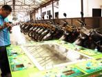 20140827_095308_mesin-gelper-hasil-razia-disimpan-di-ruang-parkir-motor-mapolresta-barelang.jpg