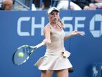 20140828_124348_caroline-wozniacki-hits-a.jpg