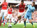 20140923_060741_mathieu-debuchy-dan-james-milner.jpg