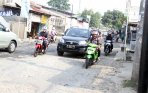 20141008_140821_jalan-raden-fatah-parung-serab-rusak-parah.jpg