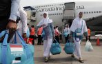 20141012_202415_jemaah-haji-kloter-pertama-tiba-di-makassar.jpg