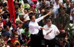 20141020_170101_arak-arakan-presiden-jokowi-dan-jk-naik-kuda-kencana.jpg
