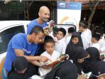 20160927_055722_tim-persib-bandung-donasi-buku-di-datsun-rising-hope-2_20160927_141346.jpg