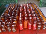 228-botol-miras-ilegal-diamankan-satgas-pamtas-ri-png-yonif-411_20200103_233623.jpg