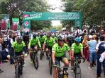 3-ribu-peserta-gowes-sepeda-nusantara-2018-mengikuti-etape-palu-nomoni_20180729_231538.jpg