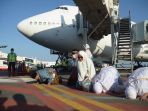 447-jamaah-haji-kloter-1-tiba-di-tanah-air_20170907_195909.jpg