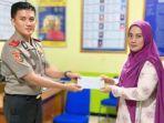 AKBP-Levi-Defriansyah-saat-melakukan-kegiatan-sosial.jpg