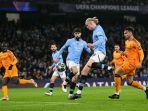 Aksi-penyerang-Manchester-City-Erling-Haaland-saat-menjebol-gawang-Real-Madrid.jpg