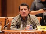 Anggota-Komisi-I-DPR-RI-Fraksi-Golkar-Yudha-Novanza-Utama-saat-menghadiri-rapat-kerja-di-DPR-RI.jpg
