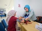 Antusiasnya-penerima-manfaat-dalam-program-cek-kesehatan-gratis-CKG.jpg