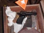 Barang-bukti-pistol-FN-yang-diduga-digunakan-korban-321.jpg