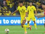 Duel-pemain-Malaysia-melawan-Laos-pada-pertandingan-lanjutan-Grup-F.jpg
