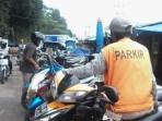 FOTO-TERBARU-Tukang-parkir-liar-IP-21-ditangkap-usai-menikam-anggota-TNI.jpg