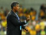 Frank-Rijkaard-mundur-dikit-kiri.jpg