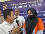 Jambi-menahan-seorang-perempuan-beV.jpg