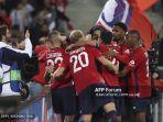Jonathan-David-dari-Lille-merayakan-golnya-melalui-tendangan-penalti.jpg