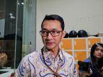 Juru-bicara-KPK-Budi-Prasetyo-saat-menyampaikan-pengembangan-kasus-321.jpg