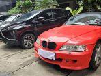 KPK-menampilkan-11-mobil-dan-dua-motor-hasil-sitaan.jpg