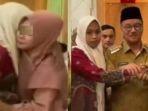 Kasus-Guru-Supriyani-Pelukan-Damai-yang-Berujung-Pencabutan-Kesepakatan.jpg