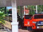 Mobil-Inafis-yang-diduga-membawa-Rohidin-Mersyah.jpg