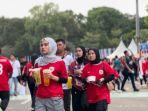 PARADE FOTO Suporter Garuda Ngabuburit Jelang Duel Timnas Indonesia Vs Bahrain di SUGBK