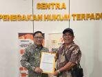 Noldi-Yohan-Awuy-melaporkan-kasus-dugaan-pelanggaran-Pilkada-Kabupaten-Minahasa-Utara.jpg