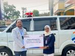 BRI Peduli Serahkan Satu Unit Ambulans untuk Yayasan Profesional Afisi Sabri di Pekanbaru