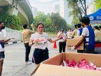 Para-pelari-berhenti-di-Water-Station-Fresh-Track-5K-Fun-Run.jpg