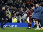 Pep-Guardiola-dan-skuad-Manchester-City-setelah-tersingkir-di-Piala-Carabao.jpg