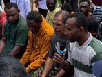 Perwakilan-petani-Orang-Asli-Papua-OAP-pada-acara-panen-di-Kampung-Telaga-Sari.jpg