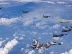 Pesawat-ditumpangi-Jokowi-dikawal-8-pesawat-jet-tempur-saat-pulang-ke-Solo.jpg