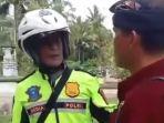 Polisi-diamankan-petugas-adat-pecalang-karena-berkeliaran-sepeda-motor-saat-Hari-Nyepi.jpg