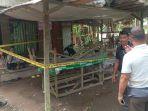 Polisi-memasang-garis-polisi-di-lokasi-pembunuhan-Kepala-Sekolah-di-Kalsel.jpg