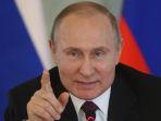 Presiden-Rusia-Vladimir-Putin-mengeluarkan-drekit-pada-hari-Senin-1692024.jpg